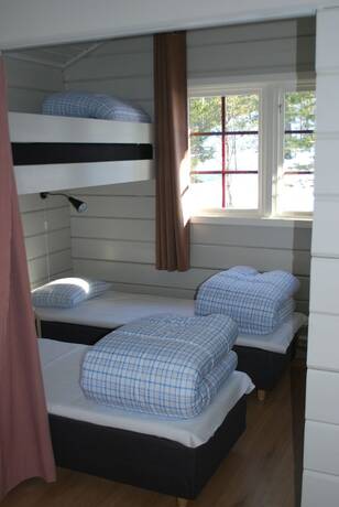 Imagen de la habitación del Hotel Lufta Camping. Foto 15