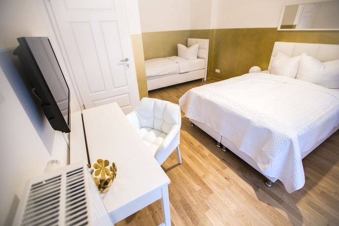 Imagen de la habitación del Hotel Luga Homes – Stadthaus. Foto 2