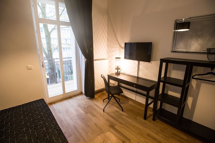 Imagen de la habitación del Hotel Luga Homes – Stadthaus. Foto 5