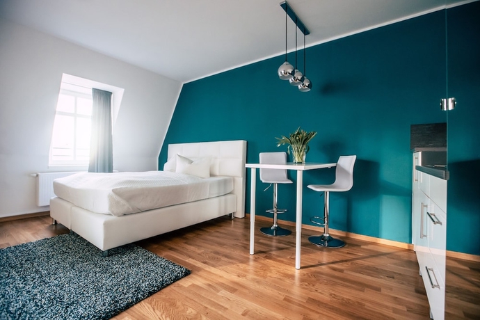 Imagen de la habitación del Hotel Luga Homes – Stadthaus. Foto 7