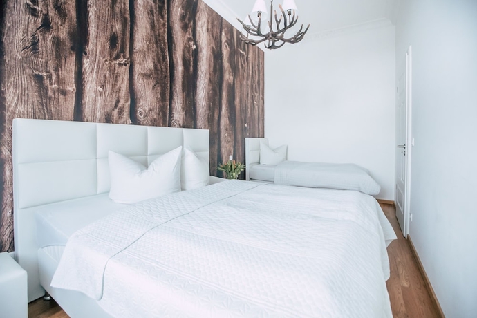 Imagen de la habitación del Hotel Luga Homes – Stadthaus. Foto 9