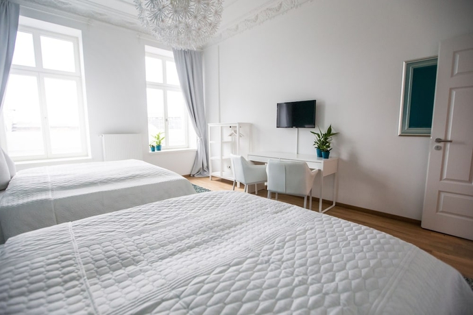 Imagen de la habitación del Hotel Luga Homes – Stadthaus. Foto 16