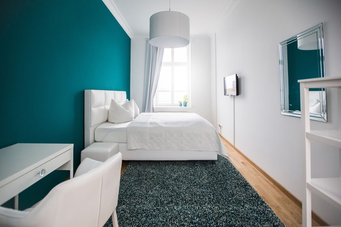 Imagen de la habitación del Hotel Luga Homes – Stadthaus. Foto 17