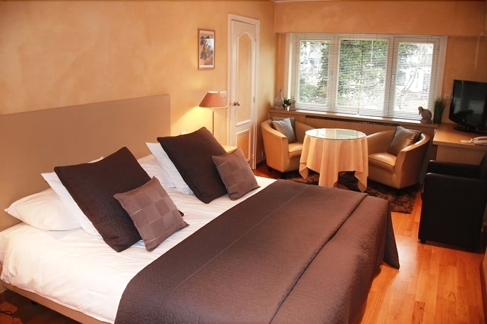 Imagen de la habitación del Hotel Lugano, KNOKKE-HEIST. Foto 12