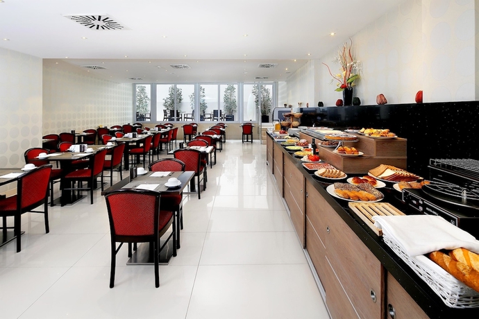 Imagen del bar/restaurante del Hotel Lugano, Parallel. Foto 2