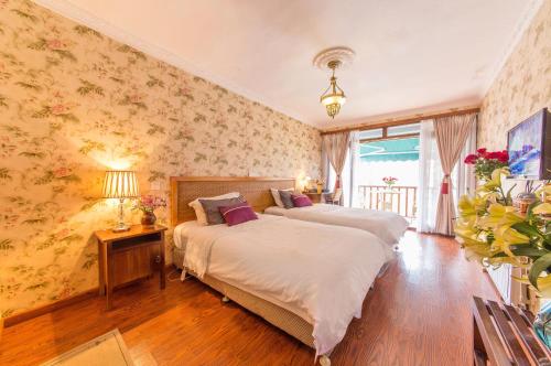 Imagen de la habitación del Hotel Lugu Lake Love Inn. Foto 6