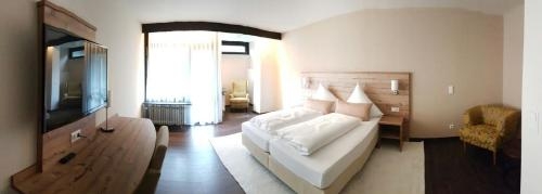 Imagen de la habitación del Hotel Luisenpark. Foto 9