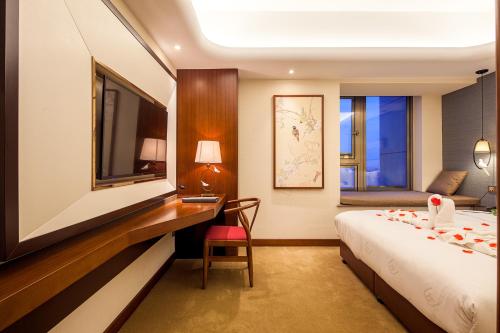 Imagen de la habitación del Hotel Lujia International. Foto 6