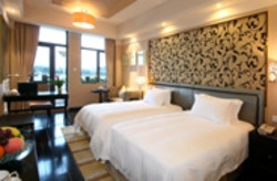Imagen de la habitación del Hotel Lujiang. Foto 3