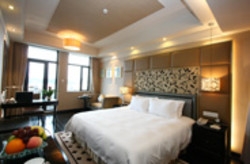 Imagen de la habitación del Hotel Lujiang. Foto 4