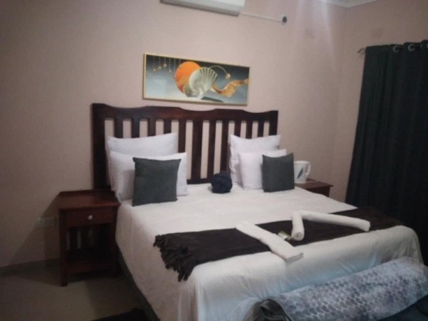 Imagen de la habitación del Hotel Lulu Guest Lodge. Foto 11