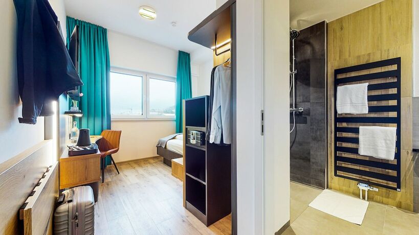 Imagen de la habitación del Hotel Luma Spa&Fitness. Foto 13
