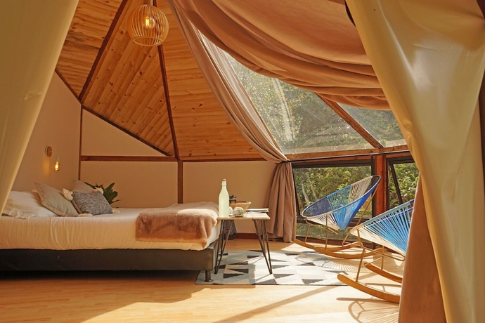 Imagen de la habitación del Hotel Lumbre Forest Lodge. Foto 11