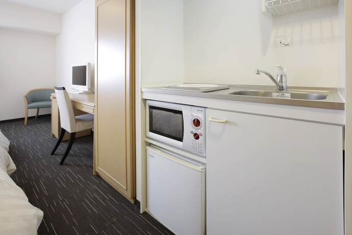 Imagen de la habitación del Hotel Lumiere Kasai. Foto 4