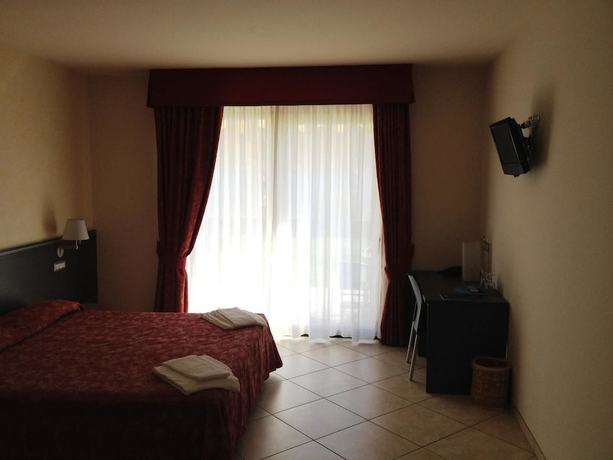 Imagen de la habitación del Hotel Lumin, Cremia. Foto 11