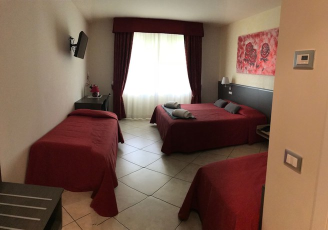 Imagen de la habitación del Hotel Lumin, Cremia. Foto 13