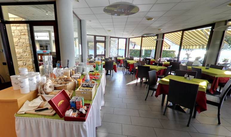 Imagen del bar/restaurante del Hotel Lumin, Cremia. Foto 4