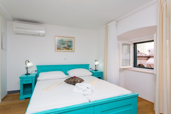 Imagen de la habitación del Hotel Lumin Guesthouse. Foto 4