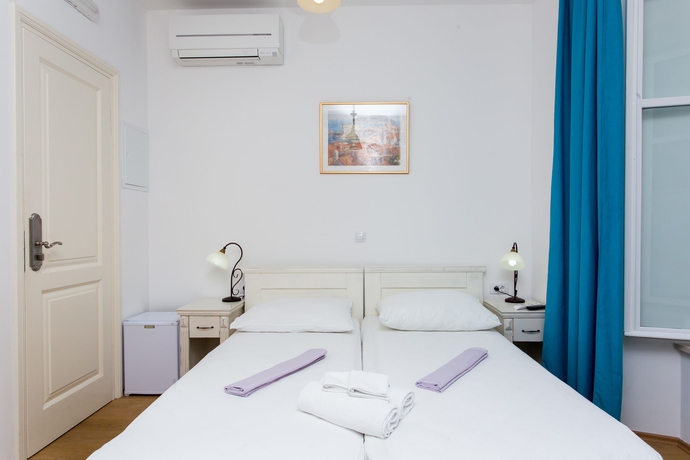 Imagen de la habitación del Hotel Lumin Guesthouse. Foto 6