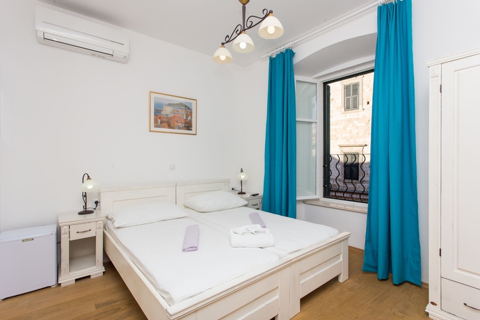 Imagen de la habitación del Hotel Lumin Guesthouse. Foto 7