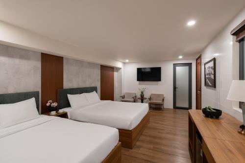 Imagen de la habitación del Hotel Lumina Da Lat Central. Foto 18