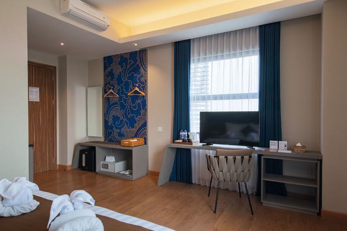 Imagen de la habitación del Hotel Luminor Aiport Sidoarjo. Foto 2