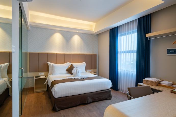 Imagen de la habitación del Hotel Luminor Aiport Sidoarjo. Foto 3