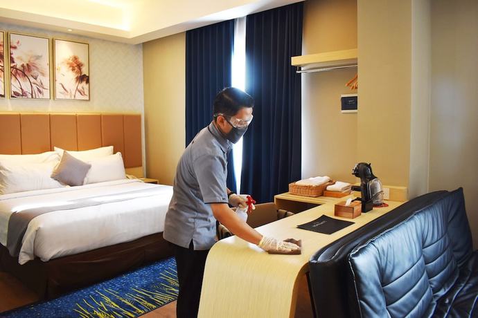 Imagen de la habitación del Hotel Luminor Aiport Sidoarjo. Foto 4