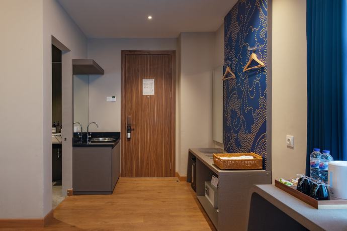 Imagen de la habitación del Hotel Luminor Aiport Sidoarjo. Foto 13