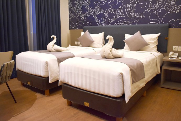 Imagen de la habitación del Hotel Luminor Aiport Sidoarjo. Foto 14