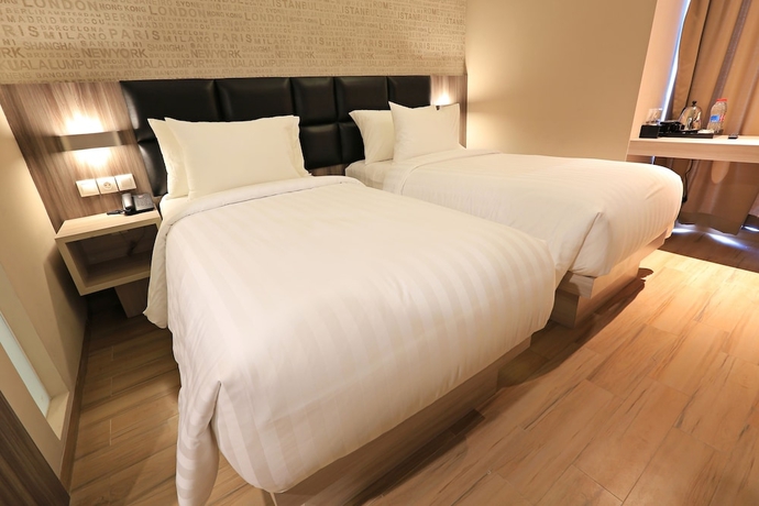 Imagen de la habitación del Hotel Luminor Jambi Kebun Jeruk. Foto 16