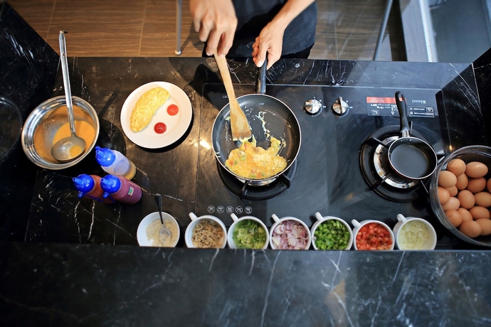 Imagen del bar/restaurante del Hotel Luminor Jambi Kebun Jeruk. Foto 2