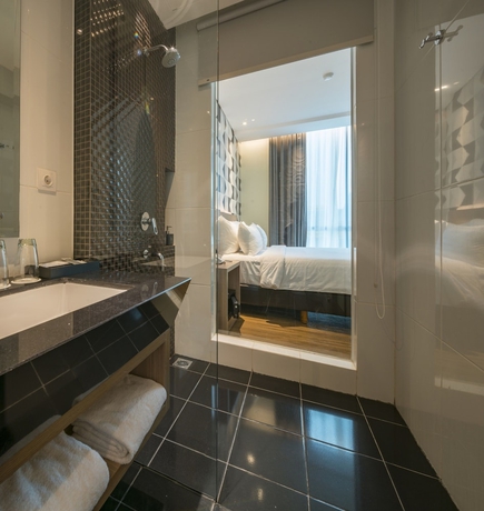 Imagen de la habitación del Hotel Luminor Pecenongan. Foto 11