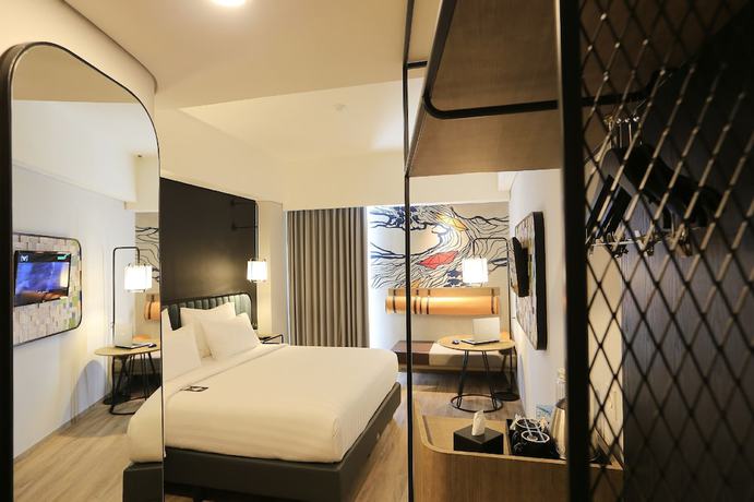 Imagen de la habitación del Hotel Luminor Purwokerto. Foto 8