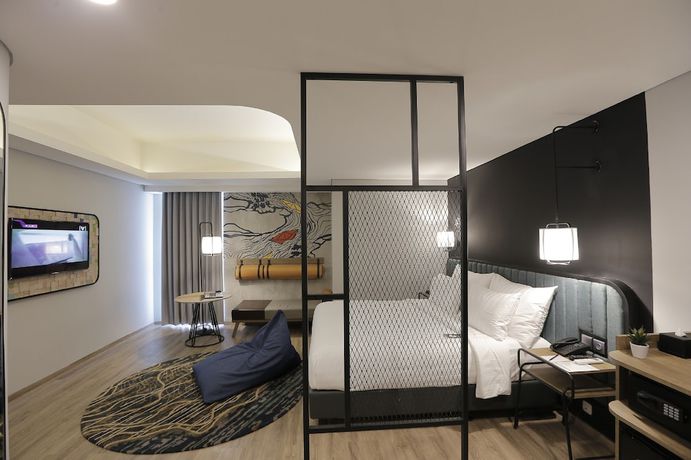 Imagen de la habitación del Hotel Luminor Purwokerto. Foto 10