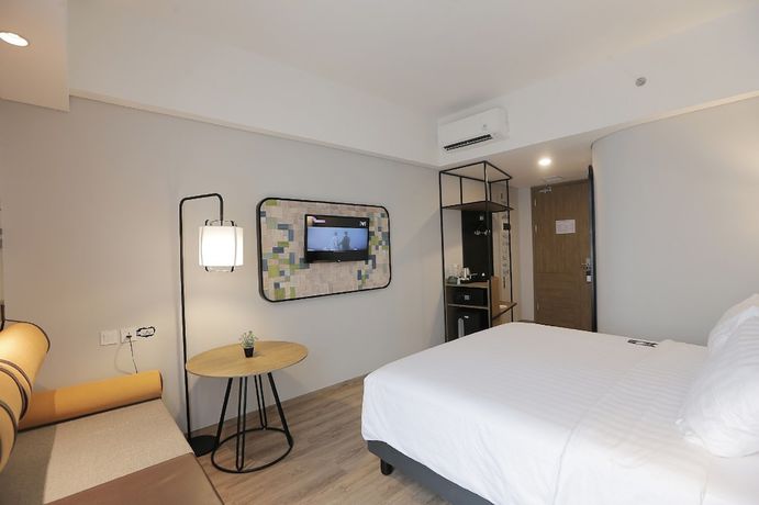 Imagen de la habitación del Hotel Luminor Purwokerto. Foto 11