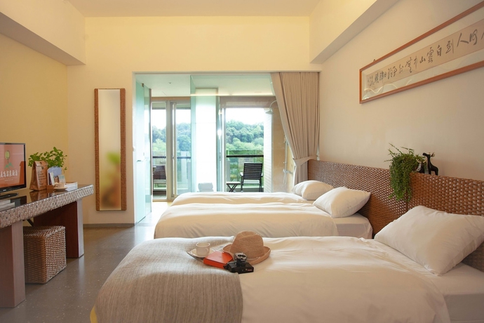 Imagen de la habitación del Hotel Luminous Hot Spring and Resort. Foto 9