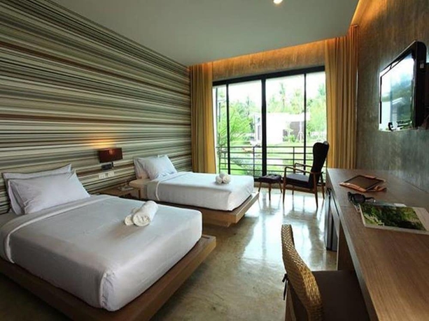 Imagen de la habitación del Hotel Lumphawa Amphawa. Foto 11