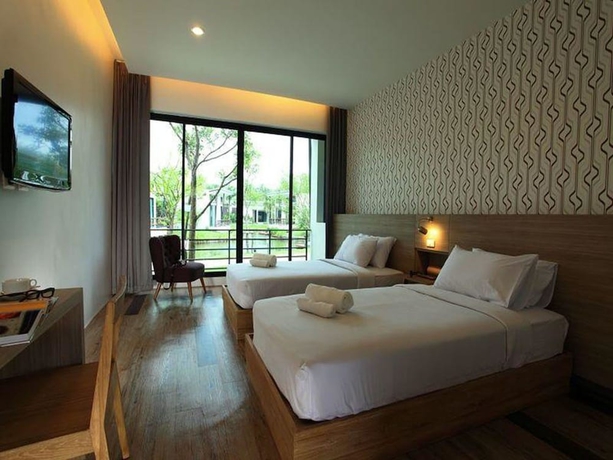 Imagen de la habitación del Hotel Lumphawa Amphawa. Foto 13