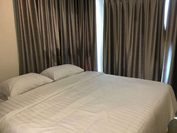 Imagen de la habitación del Hotel Lumpini Jomtien. Foto 11