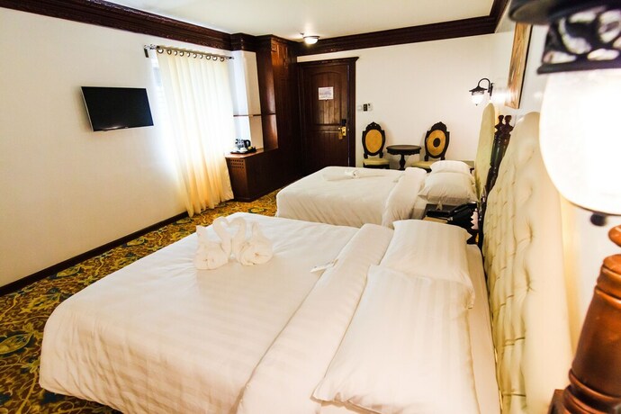 Imagen de la habitación del Hotel Luna Annex. Foto 21