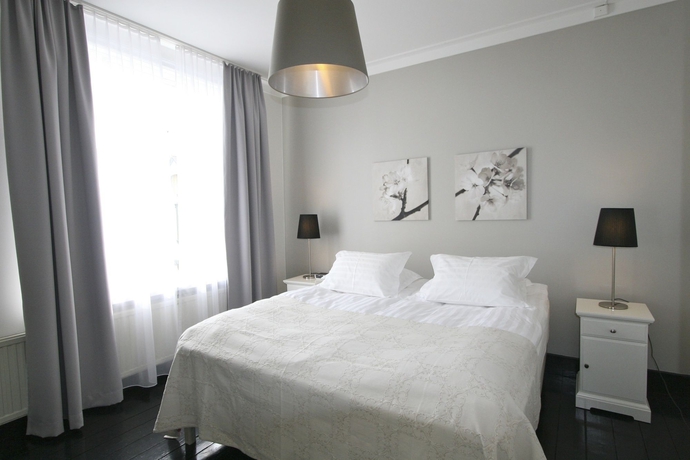 Imagen de la habitación del Hotel Luna Apartments. Foto 9