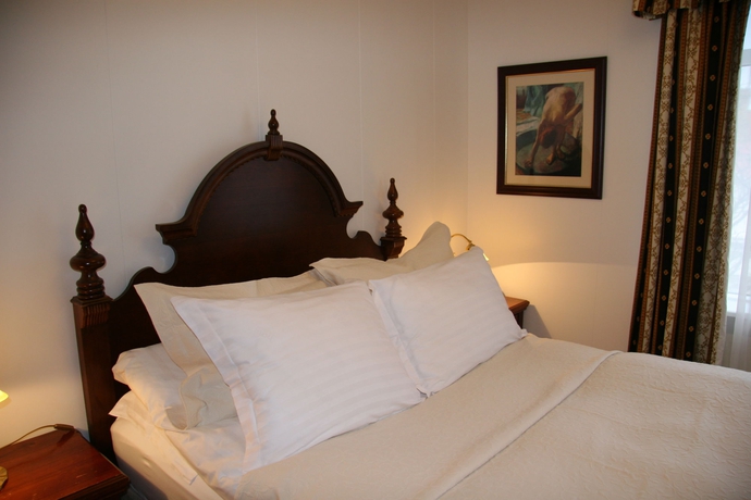 Imagen de la habitación del Hotel Luna Apartments. Foto 11