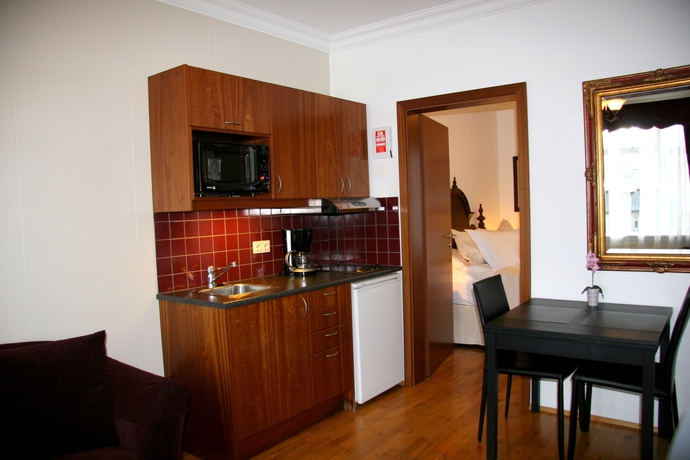 Imagen de la habitación del Hotel Luna Apartments. Foto 12