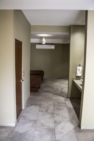 Imagen de la habitación del Hotel Luna Inn. Foto 7