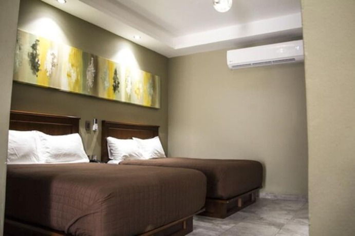 Imagen de la habitación del Hotel Luna Inn. Foto 10