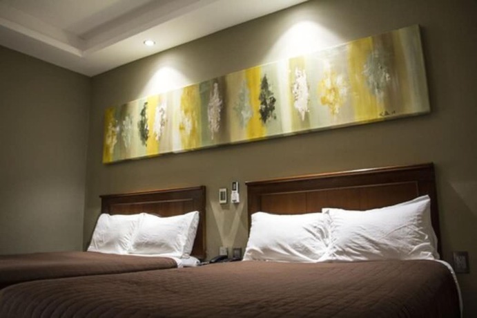 Imagen de la habitación del Hotel Luna Inn. Foto 12