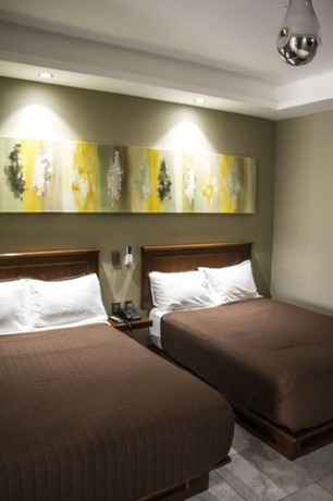 Imagen de la habitación del Hotel Luna Inn. Foto 14