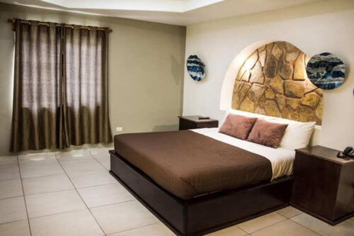 Imagen de la habitación del Hotel Luna Inn. Foto 16