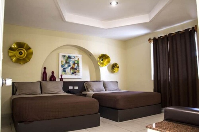 Imagen de la habitación del Hotel Luna Inn. Foto 19